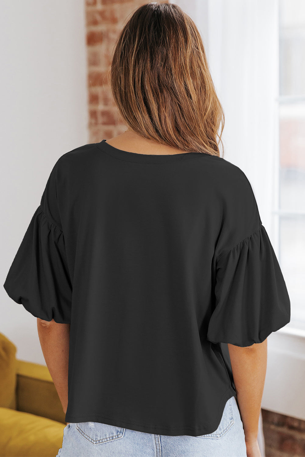 Bluse mit Puffärmeln und abgerundetem Saum