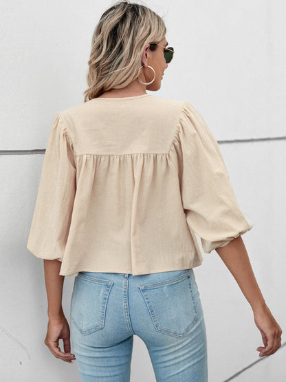 Bluse mit Ballonärmeln und Bindeband am Ausschnitt