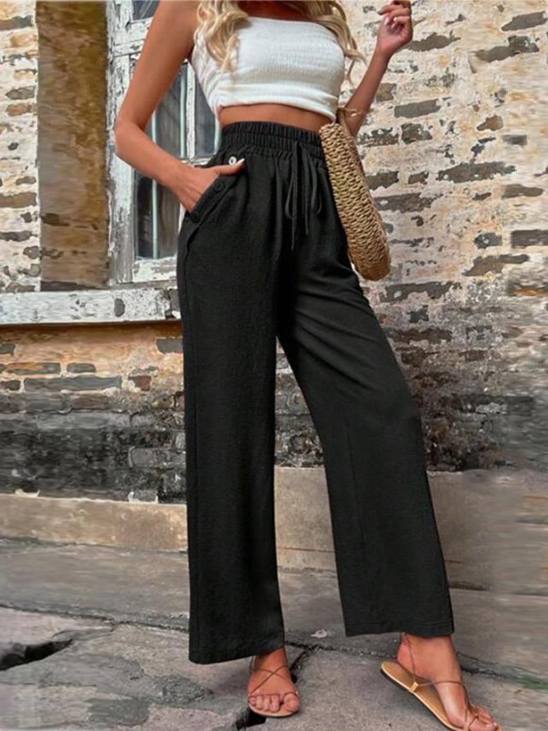 Weite Hose mit hoher Taille und Taschen zum Binden