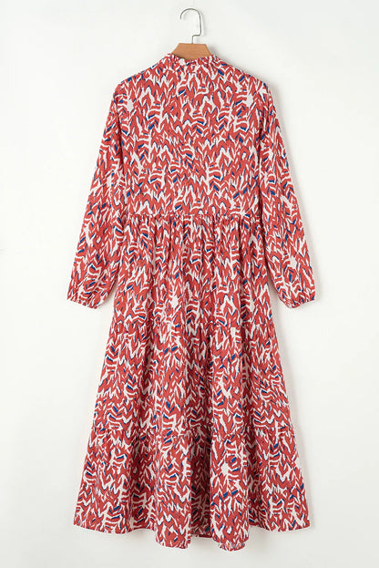 Bedrucktes Kleid mit langen Ärmeln und Kerben