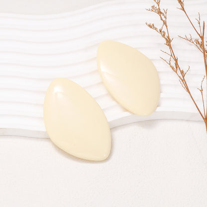 Geometrische Ohrringe aus Legierung und Harz