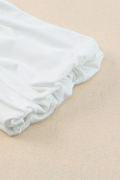 Bluse mit Puffärmeln und abgerundetem Saum