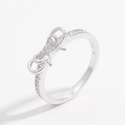 Ring mit Schleife aus 925er Sterlingsilber mit Zirkonia-Intarsien