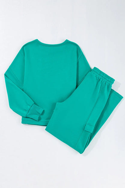 Set aus langärmligem Oberteil mit Rundhalsausschnitt und Hose mit Kordelzug in voller Größe