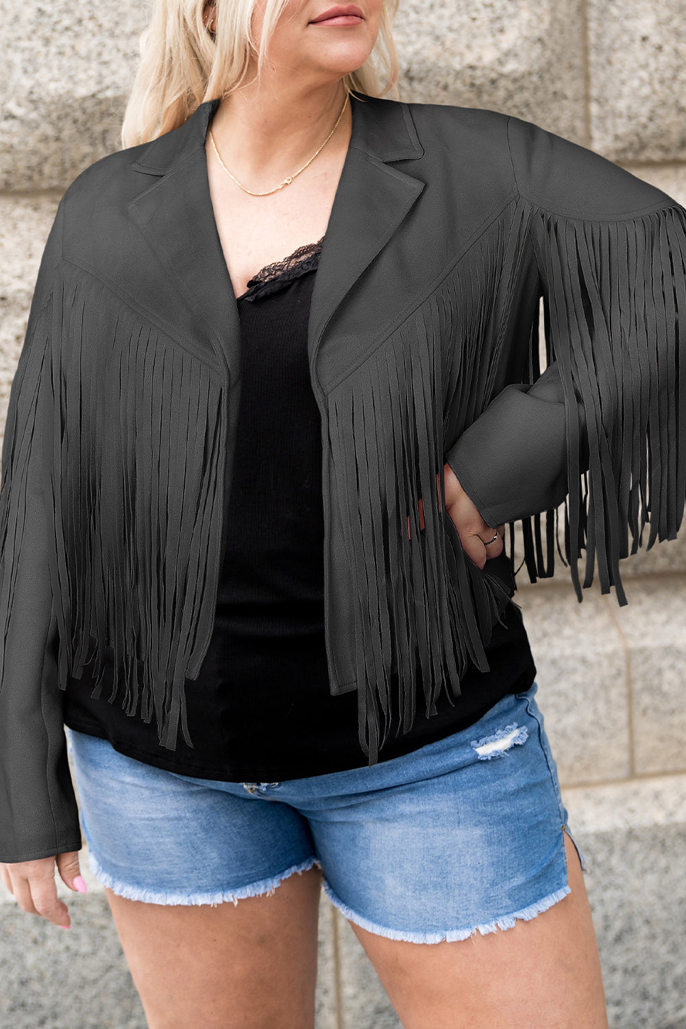 Chaqueta con frente abierto y flecos de talla grande