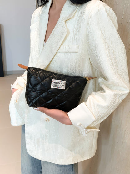 Solide gesteppte Clutch mit Reißverschluss