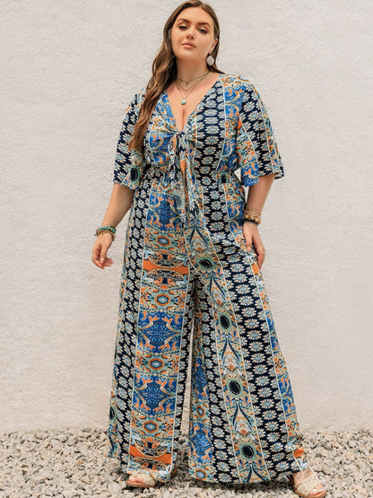 Bedruckter Jumpsuit mit halblangen Ärmeln und weitem Bein in Übergröße
