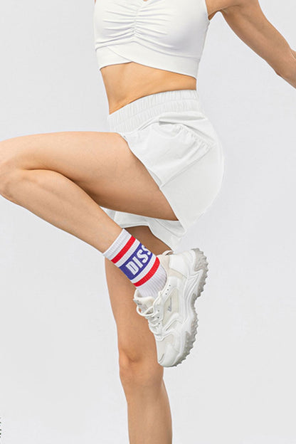 Aktive Shorts mit Taschen und elastischer Taille