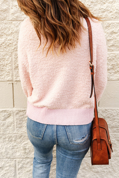 Langärmliger Pullover mit Stehkragen und Knopfdetail