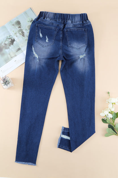 Distressed-Jeans mit Kordelzug, offenem Saum und Taschen