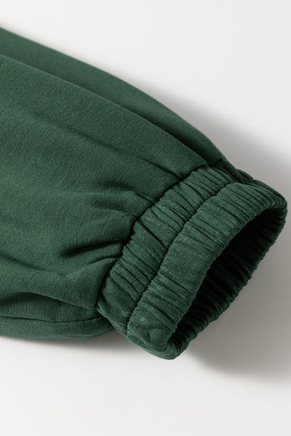 Langärmliger Strampler mit Kordelzug und halbem Reißverschluss