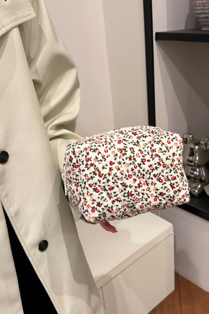 Clutch mit Blumenmuster und gestepptem Karofutter