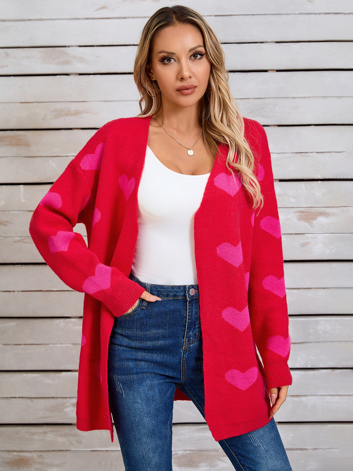 Langärmlige Strickjacke mit Engelsflügeln und Herzmuster, vorne offen