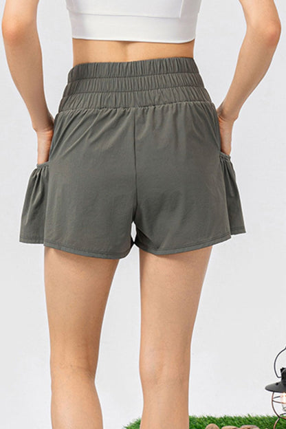 Aktive Shorts mit Taschen und elastischer Taille