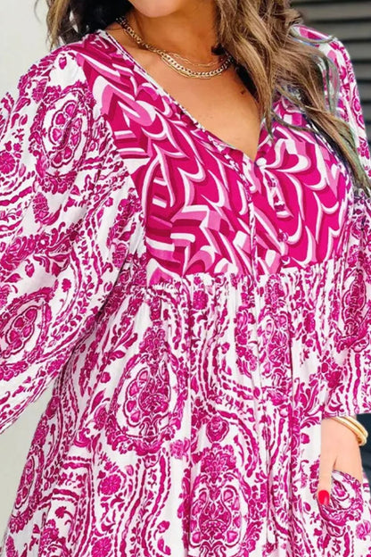 Bedrucktes, langärmliges Minikleid mit Bindeband am Kragen