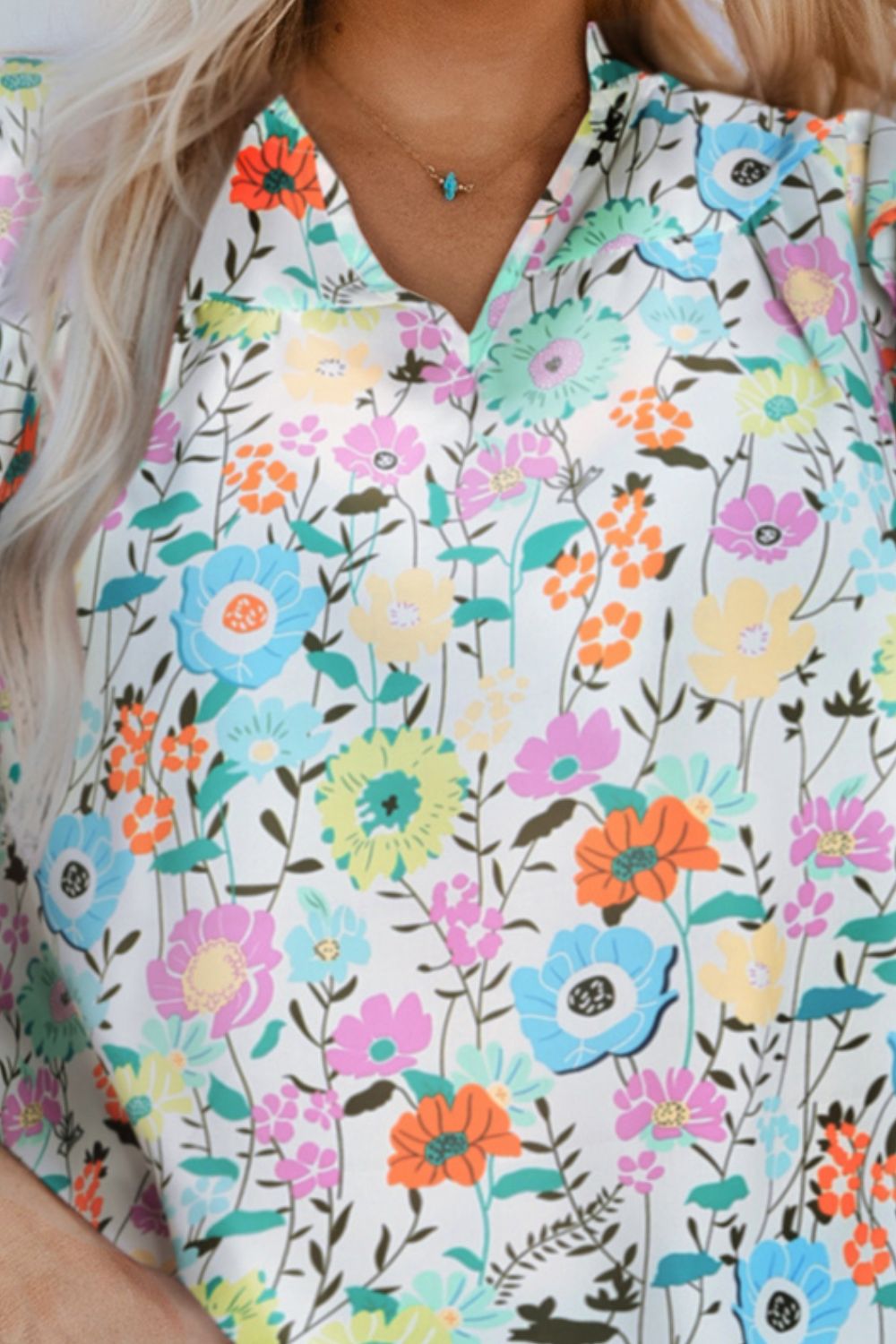 Bluse mit Blumenmuster und Flügelärmeln