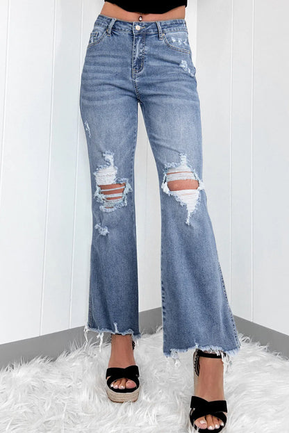Bootcut-Jeans mit Used-Look und offenem Saum