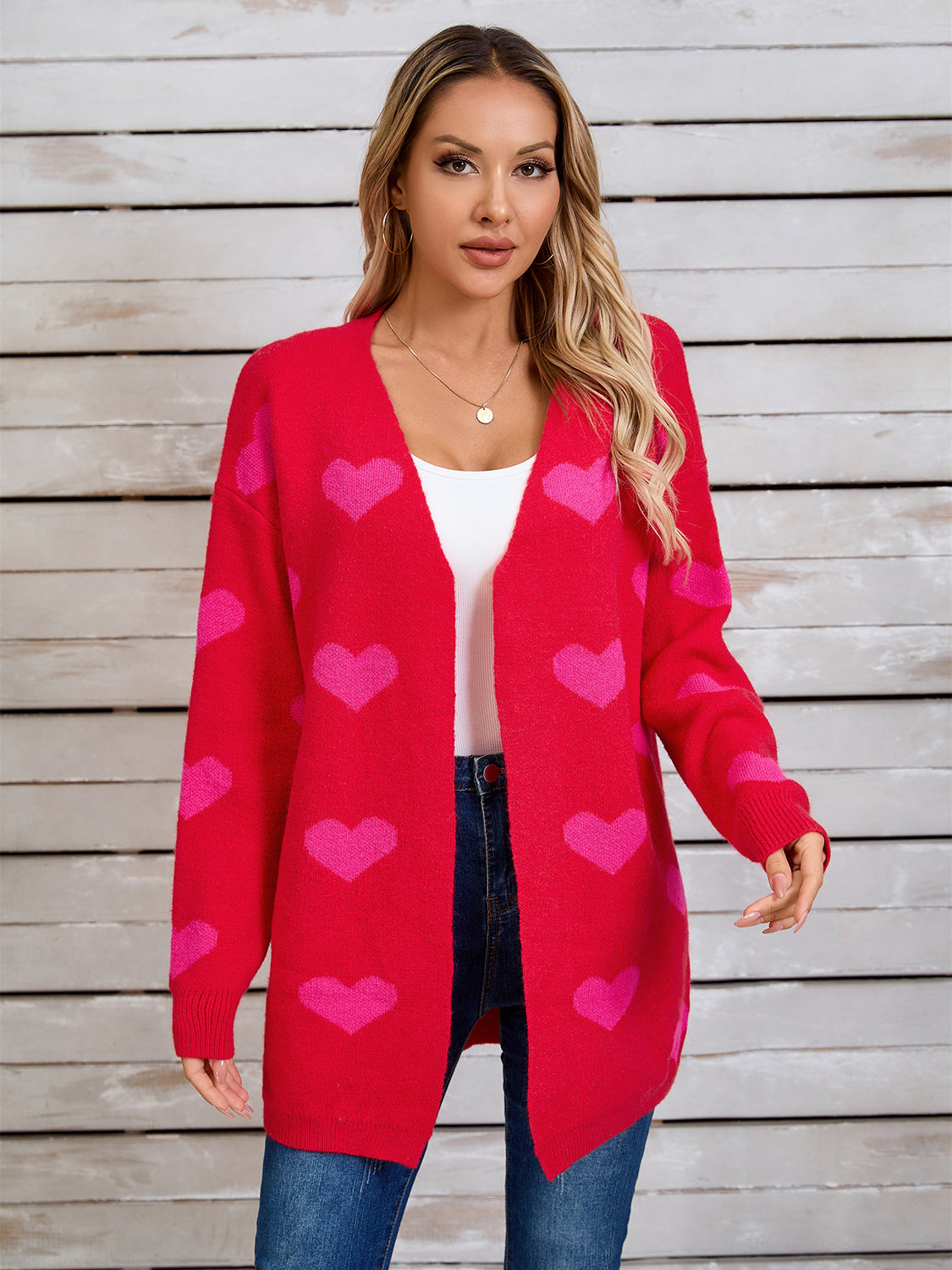 Langärmlige Strickjacke mit Engelsflügeln und Herzmuster, vorne offen