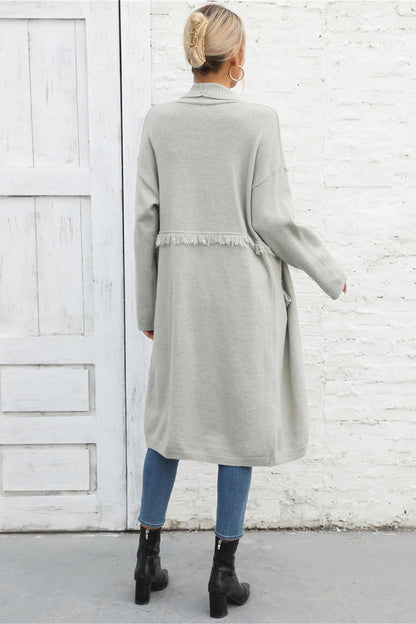 Strickjacke mit Engelsflügeln und offenen Taschen vorne