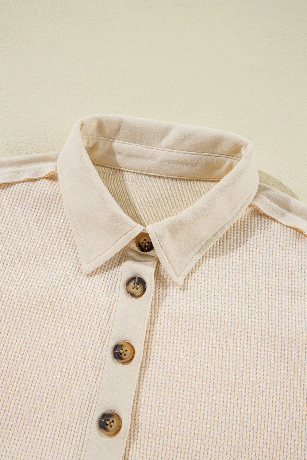 Langärmliges Oberteil mit halbhohem Knopf