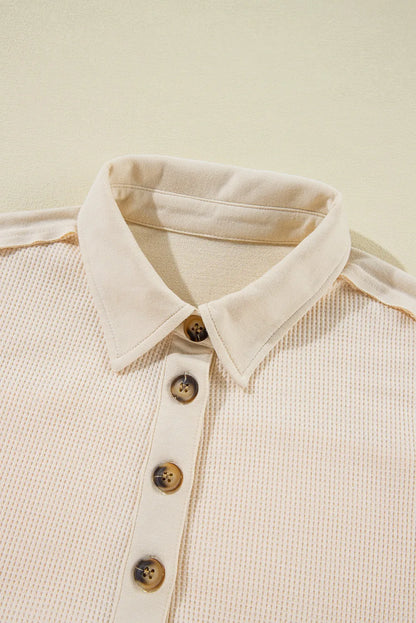 Langärmliges Oberteil mit halbhohem Knopf