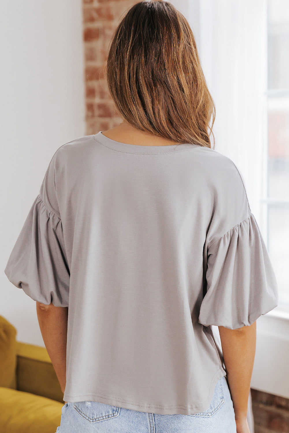 Bluse mit Puffärmeln und abgerundetem Saum