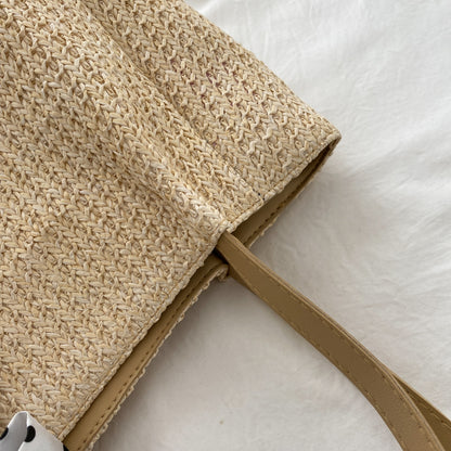 Handtasche mit gewebtem Lederriemen aus Stroh