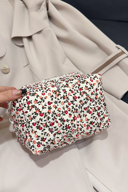 Clutch mit Blumenmuster und gestepptem Karofutter
