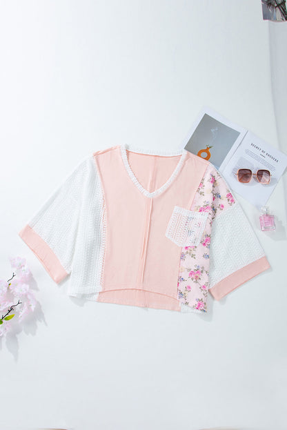 Bluse mit V-Ausschnitt und Dreiviertelärmeln und durchbrochenem Blumenmuster