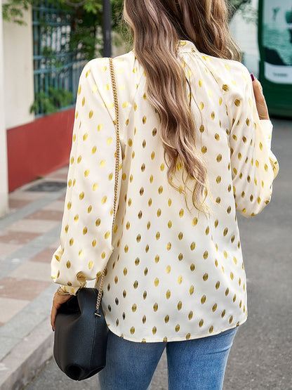 Blusa con mangas farol y escote simulado