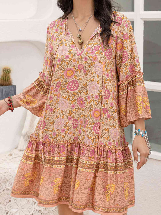 Geblümtes Minikleid mit Bindeband am Kragen