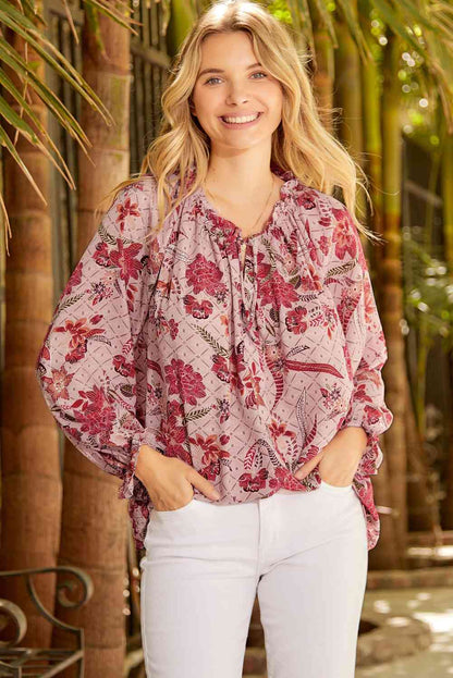 Bluse mit Blumenmuster und Volantärmeln am Kragen