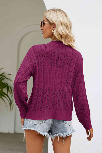 Strickjacke mit V-Ausschnitt und durchbrochener Knopfleiste vorn
