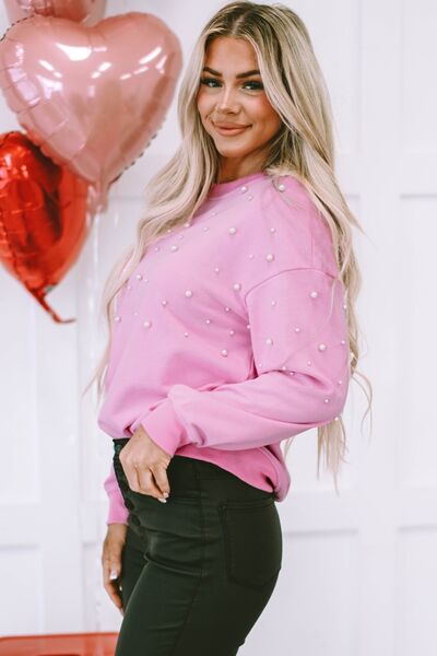 Sweatshirt mit Rundhalsausschnitt und überschnittenen Schultern und Perlen