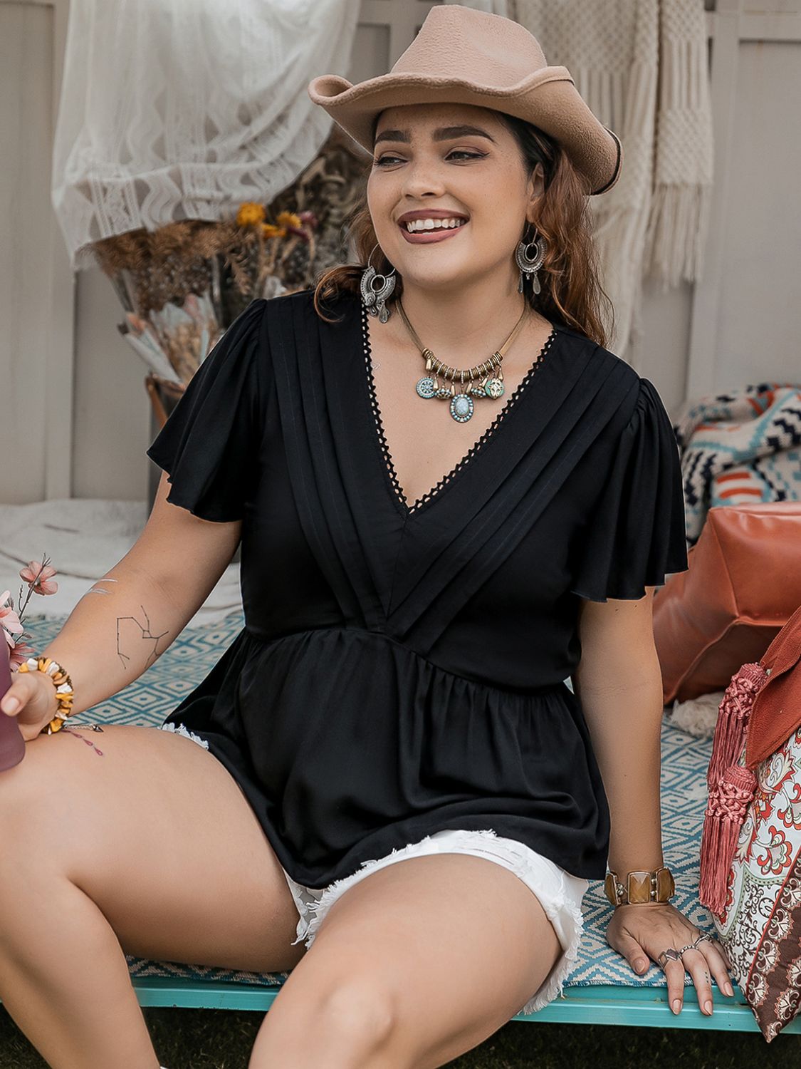 Blusa de manga acampanada con cuello en V de talla grande