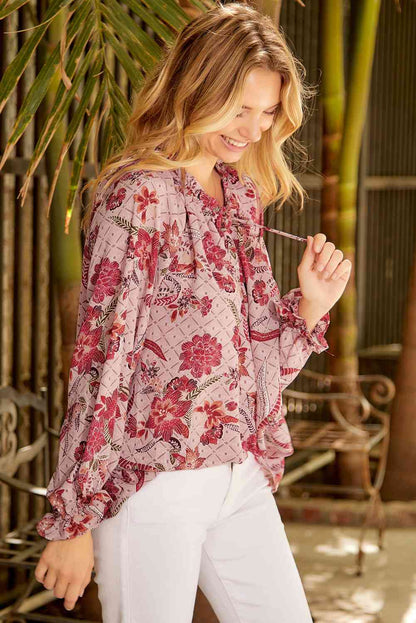 Bluse mit Blumenmuster und Volantärmeln am Kragen