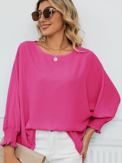 Blusa con cuello redondo y mangas farol fruncidas