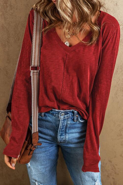 Camiseta de manga larga con cuello en V y costura expuesta