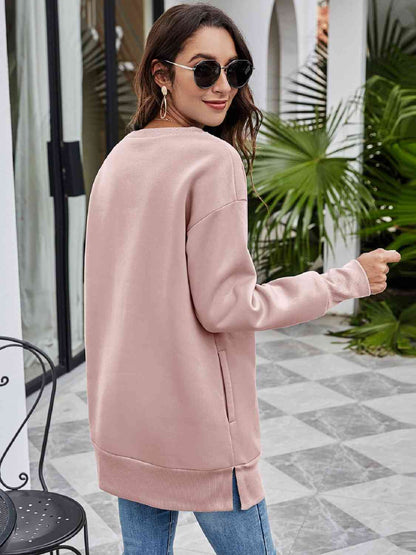 DON'T STOP BELIEVING Sweatshirt mit überschnittener Schulter und Grafik