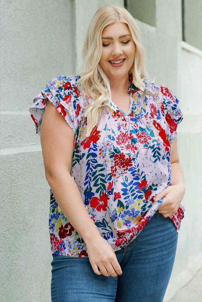 Bluse mit Blumenmuster und gesmokten Flügelärmeln in Übergröße