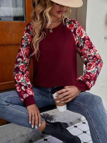 Sweatshirt mit Rundhalsausschnitt und Raglanärmeln im Blumenmuster
